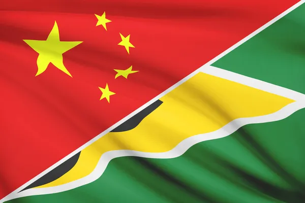Series of ruffled flags. China and Co-operative Republic of Guyana. — Stock Photo, Image