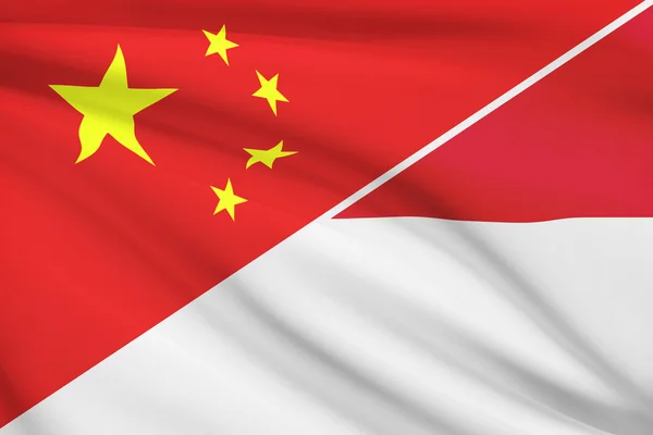 Series of ruffled flags. China and Republic of Indonesia. — Stock Photo, Image