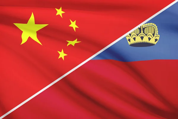 Série de drapeaux ébouriffé. la Chine et la Principauté de liechtenstein. — Photo