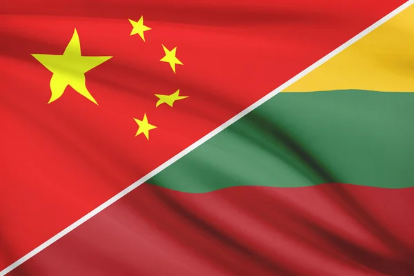 Series of ruffled flags. China and Republic of Lithuania. — Stock Photo, Image