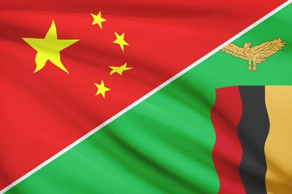 Series of ruffled flags. China and Republic of Zambia. — Stock Photo, Image