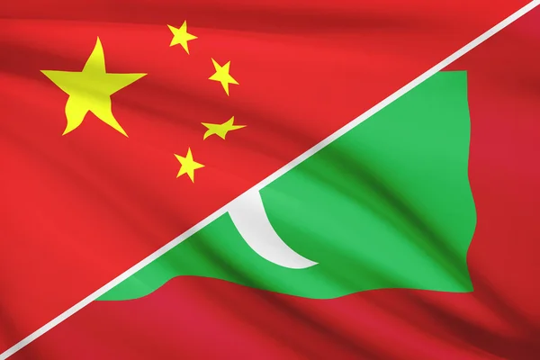 Series of ruffled flags. China and Republic of the Maldives. — Stock Photo, Image