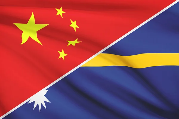 Series of ruffled flags. China and Republic of Nauru. — Stock Photo, Image