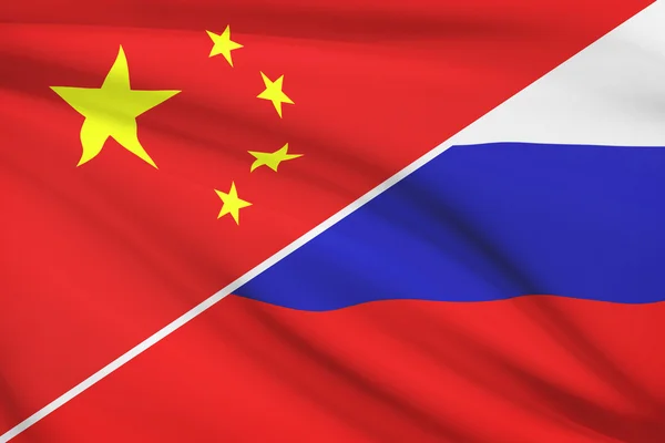 Serie de banderas con volantes. China y la Federación de Rusia. — Foto Stock