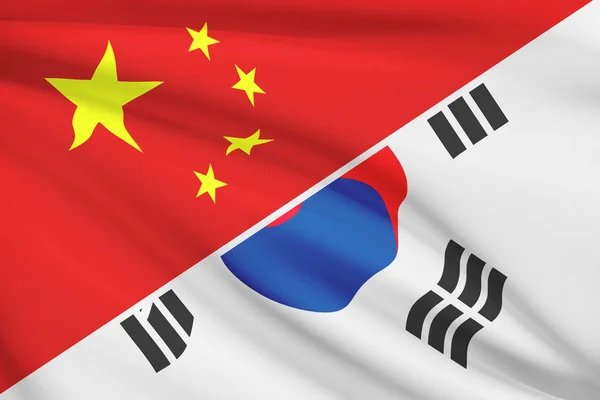 Series of ruffled flags. China and Republic of Korea (South Korea). — Stock Photo, Image