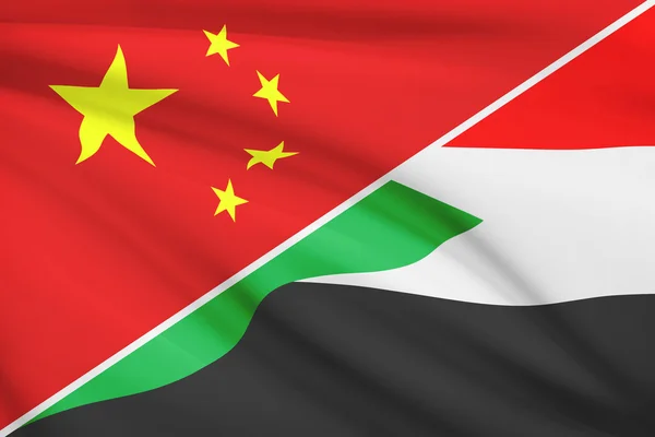Series of ruffled flags. China and Republic of the Sudan. — Stock Photo, Image
