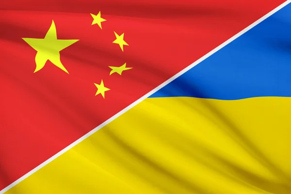 Series of ruffled flags. China and Ukraine. — Stock Photo, Image