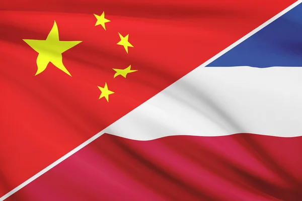 Series of ruffled flags. China and Kingdom of Yugoslavia. — Stock Photo, Image