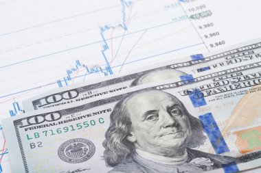 100 dolarlık banknot ile hisse senedi grafiği