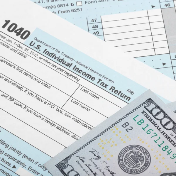 United States of America Tax Form 1040 with two 100 dollars bank - 1 to 1 ratio — Stock Photo, Image