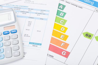 Calculator with utility bill and energy rating chart clipart