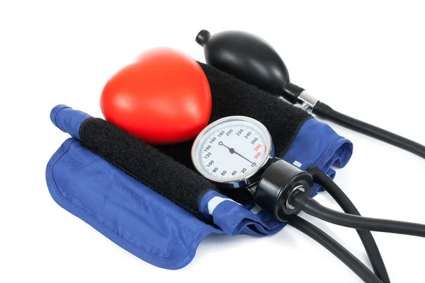 Blood pressure measuring tools with red toy heart - studio shoot on white — Stock Photo, Image