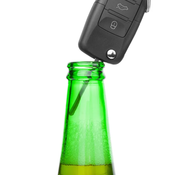 Car key in neck of bottle of bee - studio shot over white - 1 to 1 ratio — Stock Photo, Image