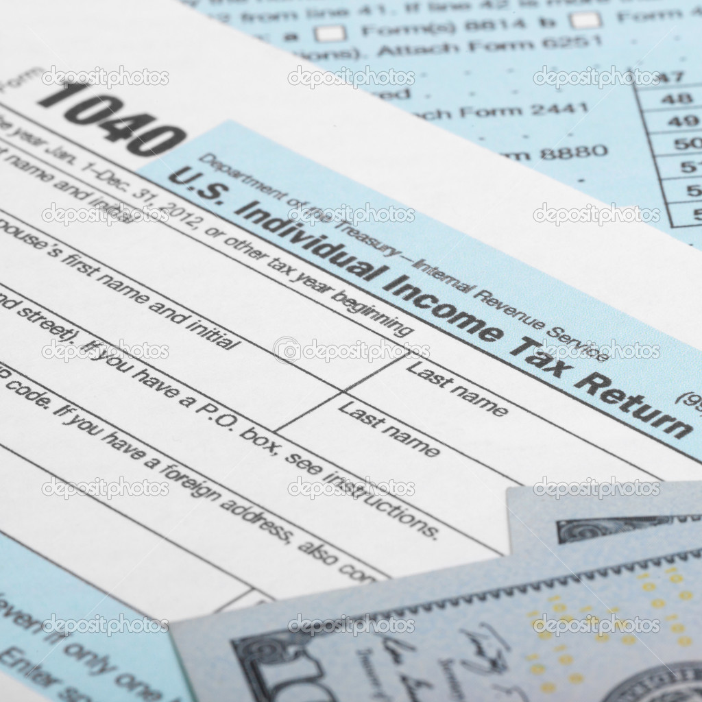 US Tax Form 1040 with 100 US dollar bills - 1 to 1 ratio