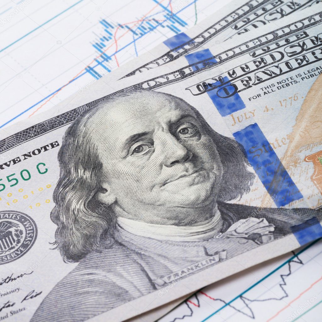 100 USA dollars banknote over stock market chart - studio shoot - 1 to 1 ratio