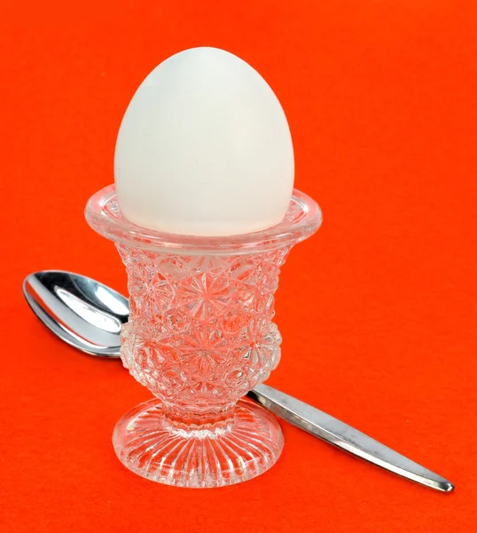 Egg in a crystal cup — Stock Photo, Image