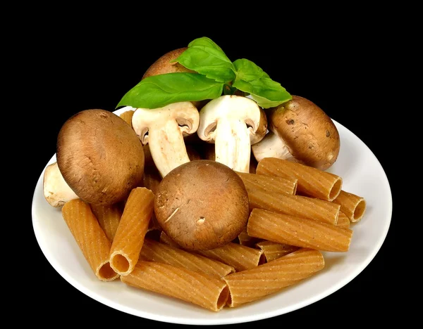 Baby bella paddestoelen, pasta en basilicum — Stockfoto