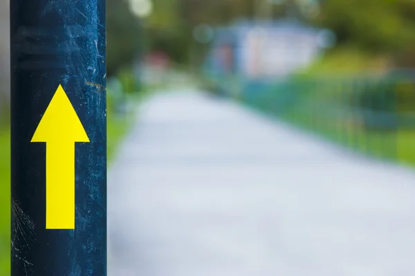 Yellow arrow — Stock Photo, Image