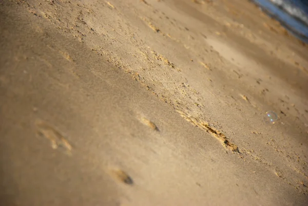 Kum üzerinde kabarcıklar — Stok fotoğraf