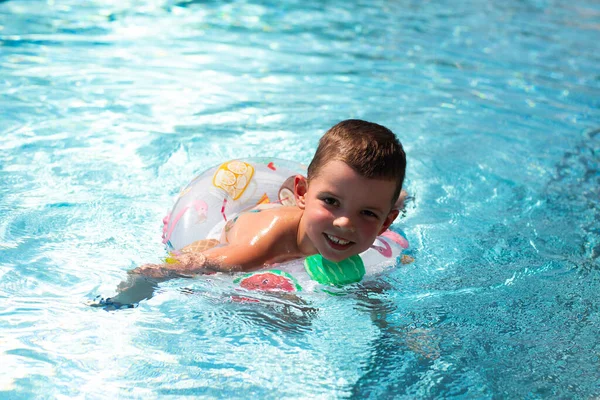Little Boy Swims Beautiful Blue Pool Inflatable Circle — Foto Stock
