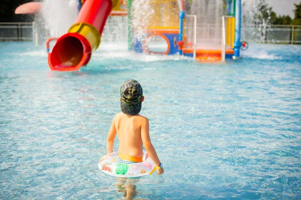 Small Boy Stands His Back Looks Water Slides Cute Boy — Stok fotoğraf