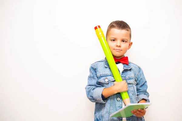 Cheerful Schoolboy Slanting Eyes Denim Jacket Red Bow Tie Holds — Stockfoto