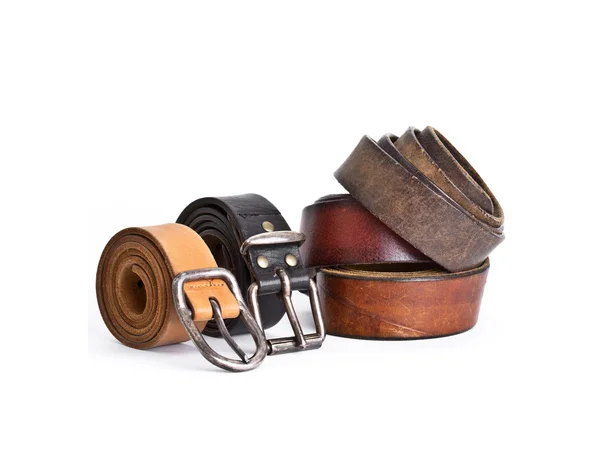 Old rolled up leather belts — Stock Photo, Image
