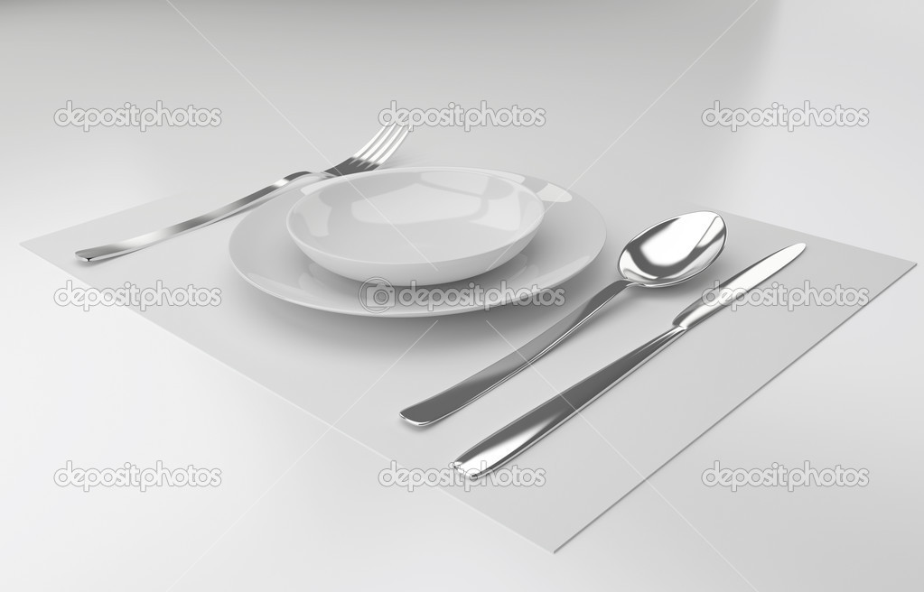A place setting with silver fork, knife spoon and white plat