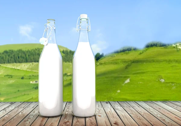 Two bottle of milk on wooden table — Stock Photo, Image