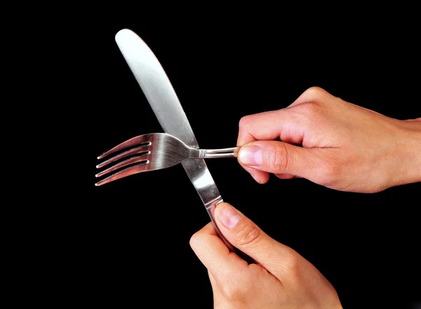 Parę rąk, widelec i nóż — Zdjęcie stockowe