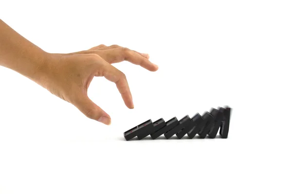 Hånd og domino – stockfoto