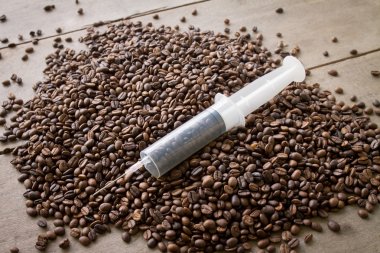 coffee seed in syringe clipart