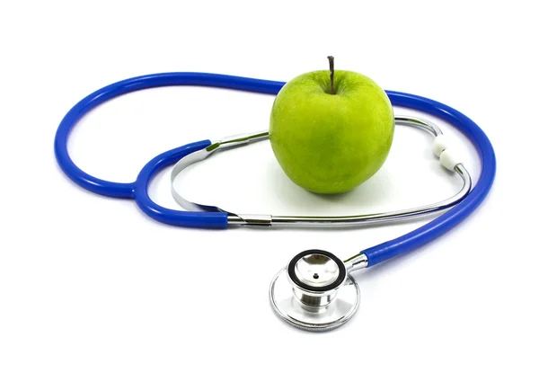 Apple and stethoscope — Stock Photo, Image