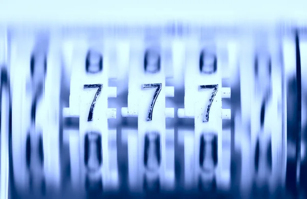 Three sevens on the old rotating counter. Jackpot! — Stock Photo, Image