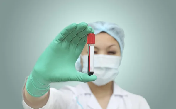 Laboratory with a test tube in hand — Stock Photo, Image