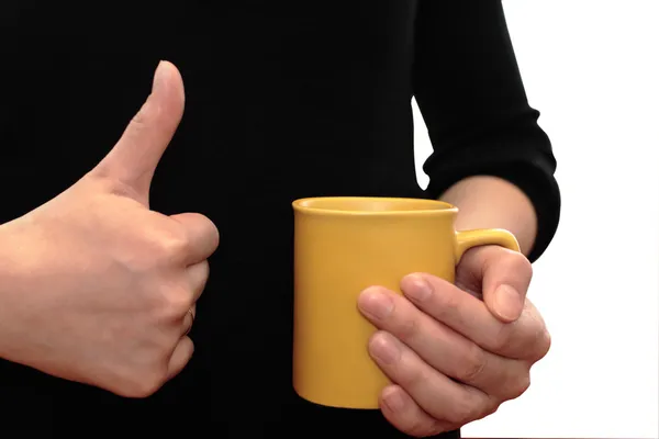 Hands holding a cup and showing "OK" — Stock Image Hands holding a cup and showing "OK" Stock Image