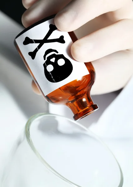 Hand with poison. Symbol of the crime. — Stock Photo, Image