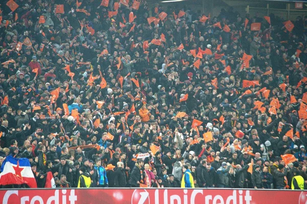 Fans at the football stadium — Stock Photo, Image