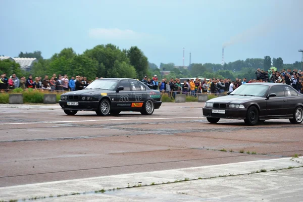 Pilotes non identifiés pendant le championnat de course de drag — Photo