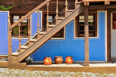 Wooden stairs and an old house in Koprivshtitsa Bulgaria, from t clipart