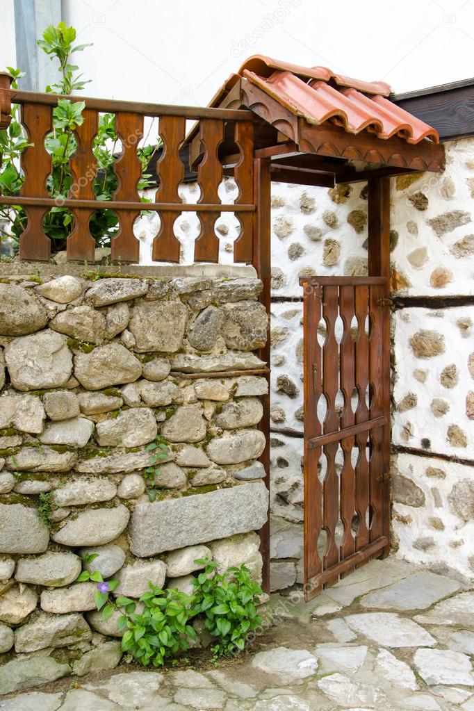 Open wooden door of a house in Melnik, Bulgaria