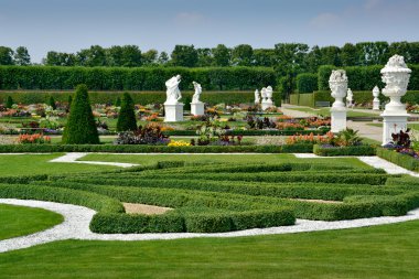 Garden with sculptures in Herrenhausen Gardens, Hanover, Germany clipart