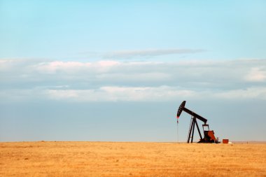 Working oil pump on Nebraska Great Plains clipart