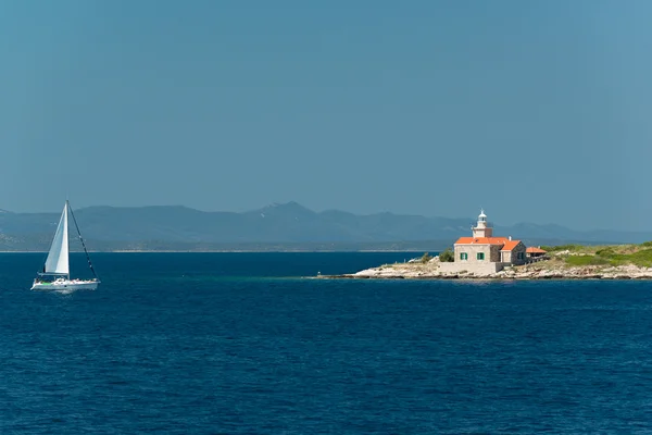 Lighthouse and Yacht — Stock Photo, Image