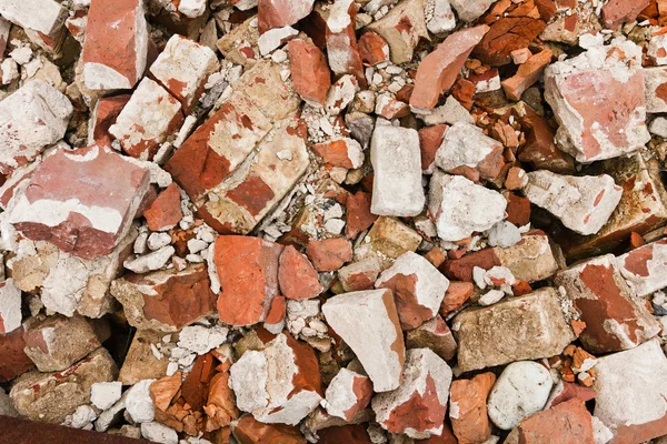 A pile of old broken red bricks — Stock Photo, Image