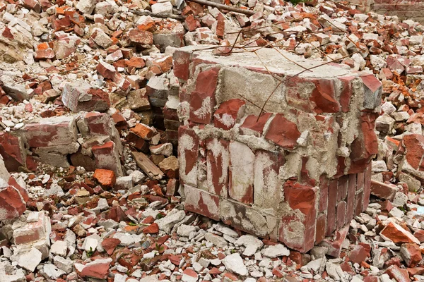 A pile of old broken red bricks