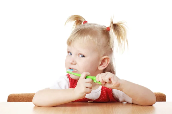 Niño con cepillo de dientes —  Fotos de Stock