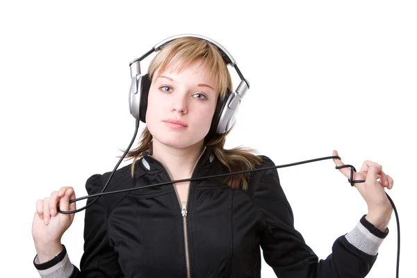 Girl with a cable of earphones — Stock Photo, Image