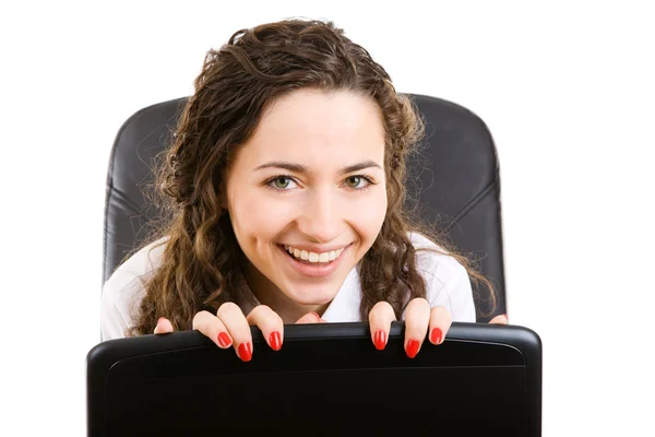 Happy businesswoman in armchair Stock Photo