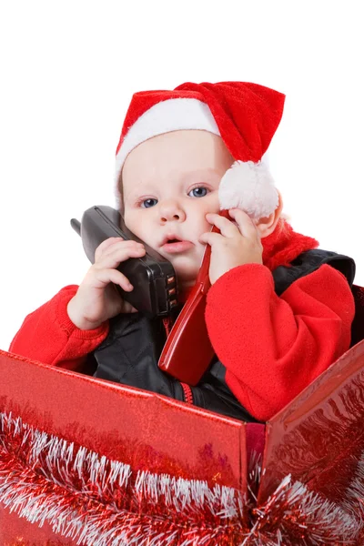 Criança chamando por telefone na caixa de Natal — Fotografia de Stock